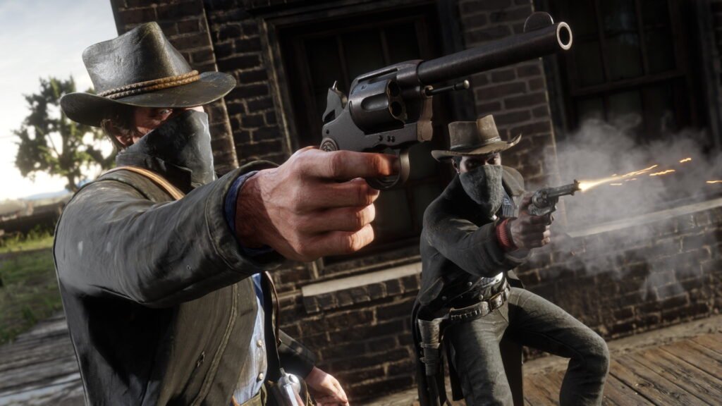 Two men in cowboy garments aim their pistols at something in the distance. One is firing his pistol.